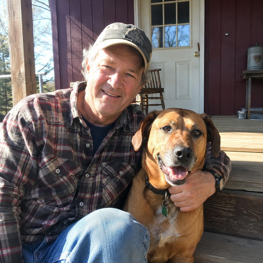 James T. with his dog on the porch