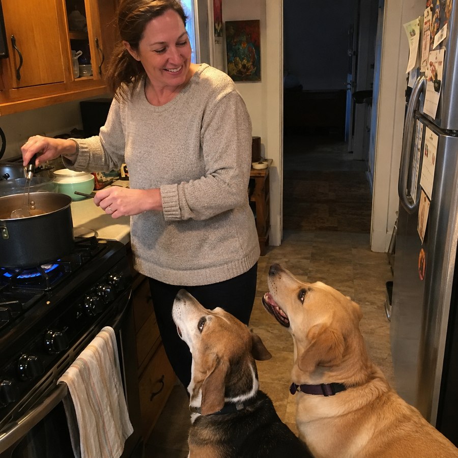 Sarah M. cooking for her two dogs